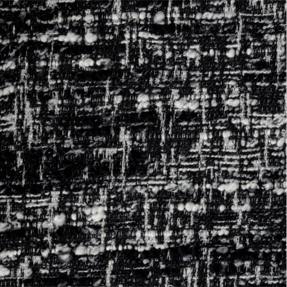 Fauteuil bouclé blanc et noir