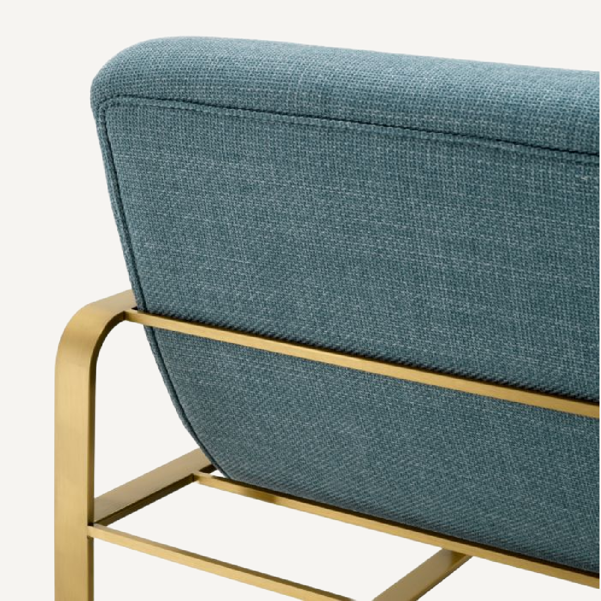 Fauteuil en tissu bleu mer