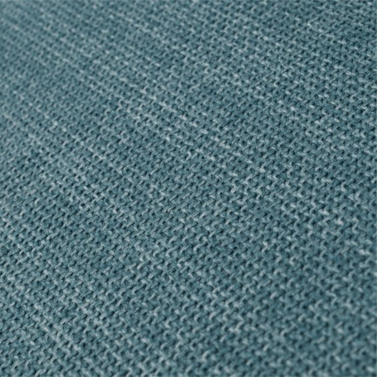 Fauteuil en tissu bleu mer