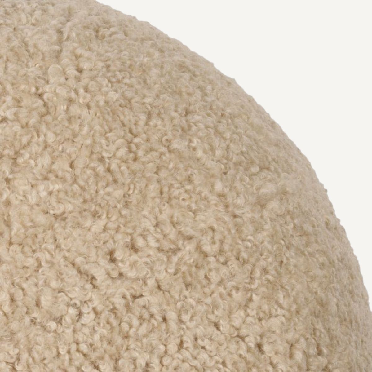 Coussin rond molletonné sable S